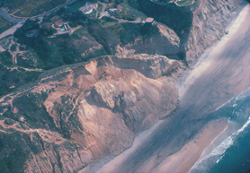 Landslide in cliff above Blacks Beach, 1970's